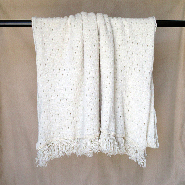 pointelle blanket with fringed ends white