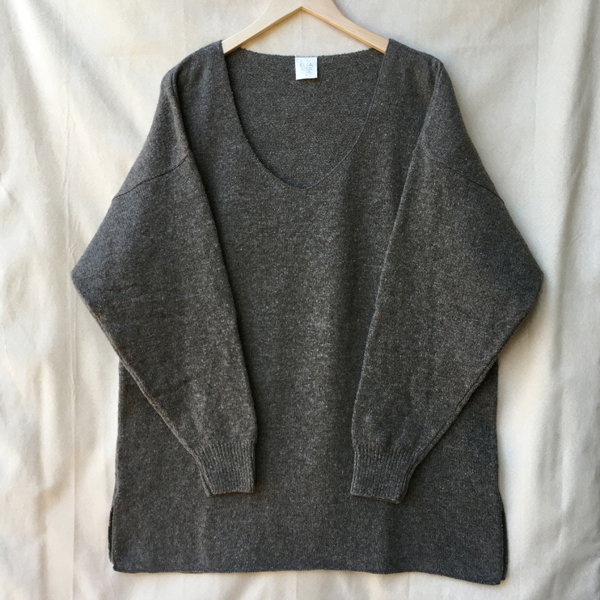 serged-edge tunic-length sweater
